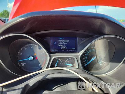 Zdjęcie 9 z 13 samochodu: 2012 FORD FOCUS SEL VIN:1FAHP3H26CL416570 - miniatura