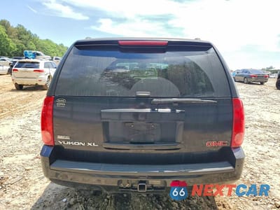 Zdjęcie 6 z 13 samochodu: 2007 GMC YUKON XL C1500 VIN:1GKFC16067R269466 - miniatura