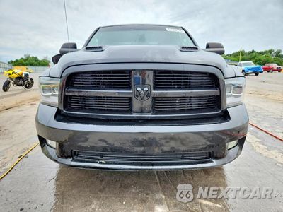 Piąte zdjęcie samochodu w środku: 2011 DODGE RAM 1500 VIN:1D7RV1GT1BS624580 - miniatura
