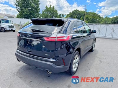 Trzecie zdjęcie samochodu z tyłu: 2020 FORD EDGE SE VIN:2FMPK4G9XLBA02101 - miniatura