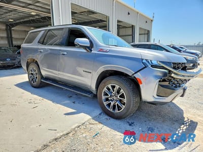 Czwarte zdjęcie samochodu z boku: 2022 CHEVROLET TAHOE K1500 Z71 VIN:1GNSKPKD1NR324385 - miniatura