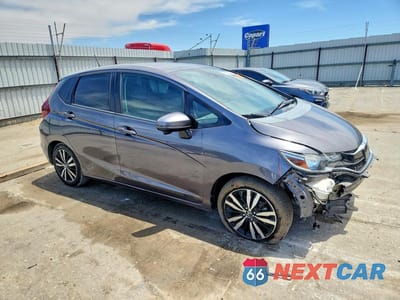 Czwarte zdjęcie samochodu z boku: 2018 HONDA FIT EX VIN:3HGGK5H82JM717936 - miniatura