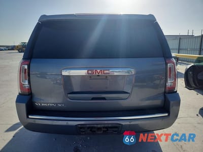 Zdjęcie 6 z 13 samochodu: 2019 GMC YUKON XL DENALI VIN:1GKS2HKJXKR263882 - miniatura