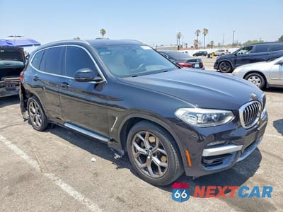 Czwarte zdjęcie samochodu z boku: 2021 BMW X3 XDRIVE30E VIN:5UXTS1C05M9G31824 - miniatura