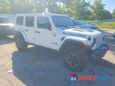 Czwarte zdjęcie samochodu z boku: 2022 JEEP WRANGLER UNLIMITED RUBICON 4XE VIN:1C4JJXR64NW211580 - miniatura