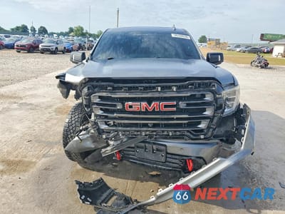 Piąte zdjęcie samochodu w środku: 2021 GMC SIERRA K1500 AT4 VIN:3GTP9EEL1MG186072 - miniatura