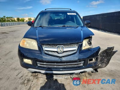 Piąte zdjęcie samochodu w środku: 2004 ACURA MDX TOURING VIN:2HNYD18854H529401 - miniatura