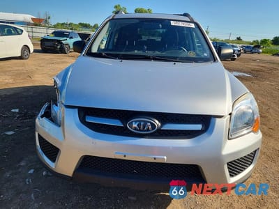 Piąte zdjęcie samochodu w środku: 2009 KIA SPORTAGE LX VIN:KNDJF724097641164 - miniatura