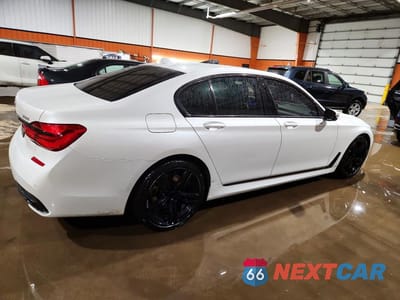 Trzecie zdjęcie samochodu z tyłu: 2016 BMW 750 XI VIN:WBA7B0C52GGF92213 - miniatura