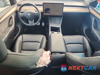 Zdjęcie 8 z 13 samochodu: 2023 TESLA MODEL Y VIN:7SAYGDEF7PF874976 - miniatura