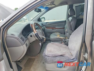 Zdjęcie 7 z 13 samochodu: 2004 TOYOTA SIENNA XLE 7 PASSENGER VIN:5TDBA22C14S017742 - miniatura