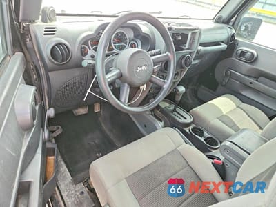 Zdjęcie 8 z 13 samochodu: 2010 JEEP WRANGLER SPORT VIN:1J4AA2D1XAL112136 - miniatura