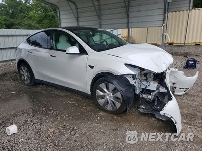 Czwarte zdjęcie samochodu z boku: 2023 TESLA MODEL Y VIN:7SAYGDED5PF940780 - miniatura