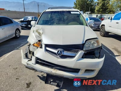 Piąte zdjęcie samochodu w środku: 2004 ACURA MDX TOURING VIN:2HNYD189X4H536160 - miniatura