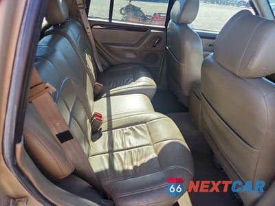 Zdjęcie 10 z 12 samochodu: 2001 JEEP GRAND CHEROKEE LIMITED VIN:1J4GW58N01C627348 - miniatura