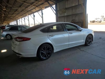 Trzecie zdjęcie samochodu z tyłu: 2018 FORD FUSION SE VIN:3FA6P0HD2JR267340 - miniatura