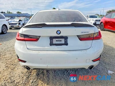 Zdjęcie 6 z 12 samochodu: 2021 BMW 330I VIN:3MW5R1J08M8C13562 - miniatura