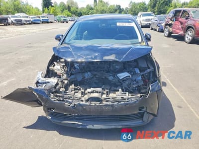 Piąte zdjęcie samochodu w środku: 2022 TOYOTA PRIUS LE VIN:JTDKAMFU3N3179342 - miniatura