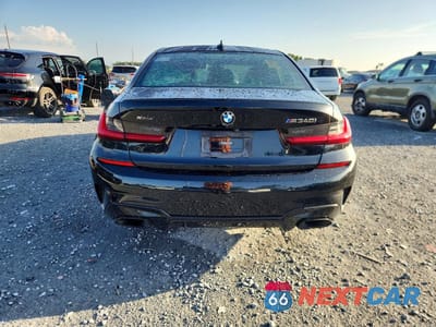 Zdjęcie 6 z 12 samochodu: 2021 BMW M340XI VIN:3MW5U9J07M8B65498 - miniatura