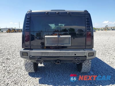 Zdjęcie 6 z 13 samochodu: 2003 HUMMER H2 VIN:5GRGN23U03H120685 - miniatura