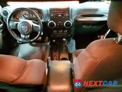 Zdjęcie 8 z 12 samochodu: 2016 JEEP WRANGLER SPORT VIN:1C4AJWAG7GL117938 - miniatura