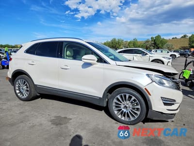 Czwarte zdjęcie samochodu z boku: 2015 LINCOLN MKC VIN:5LMCJ2A92FUJ30780 - miniatura