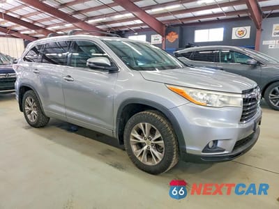 Czwarte zdjęcie samochodu z boku: 2014 TOYOTA HIGHLANDER XLE VIN:5TDJKRFH1ES067839 - miniatura