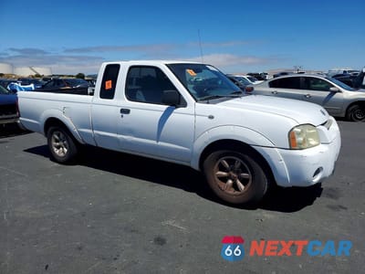 Czwarte zdjęcie samochodu z boku: 2001 NISSAN FRONTIER KING CAB XE VIN:1N6DD26SX1C378754 - miniatura