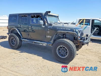 Czwarte zdjęcie samochodu z boku: 2012 JEEP WRANGLER UNLIMITED RUBICON VIN:1C4BJWFGXCL178580 - miniatura