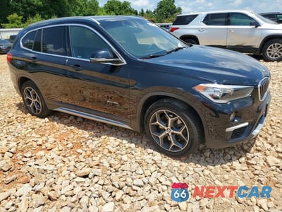 Czwarte zdjęcie samochodu z boku: 2018 BMW X1 XDRIVE28I VIN:WBXHT3Z30J4A66556 - miniatura