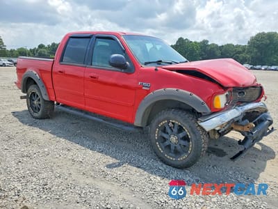 Czwarte zdjęcie samochodu z boku: 2001 FORD F150 SUPERCREW VIN:1FTRW08L31KC05032 - miniatura