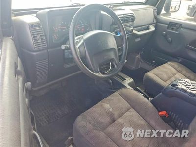 Zdjęcie 8 z 12 samochodu: 2003 JEEP WRANGLER COMMANDO VIN:1J4FA39S53P363364 - miniatura