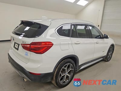 Trzecie zdjęcie samochodu z tyłu: 2018 BMW X1 SDRIVE28I VIN:WBXHU7C38J5H39715 - miniatura