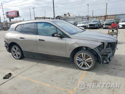 Czwarte zdjęcie samochodu z boku: 2024 BMW IX XDRIVE50 VIN:WB523CF03RCR15800 - miniatura