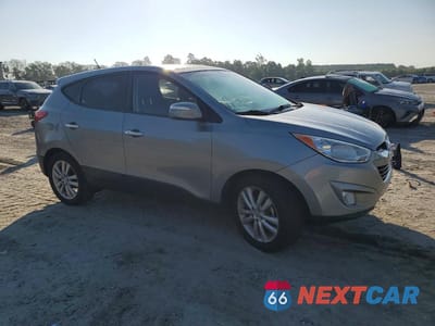 Czwarte zdjęcie samochodu z boku: 2013 HYUNDAI TUCSON LIMITED VIN:KM8JU3AC6DU665238 - miniatura