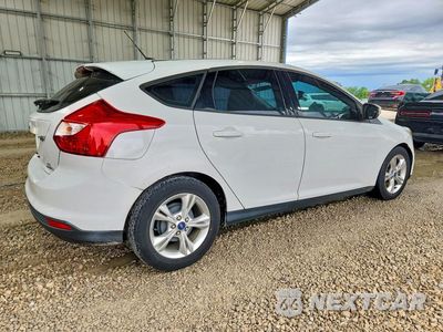 Trzecie zdjęcie samochodu z tyłu: 2013 FORD FOCUS SE VIN:1FADP3K22DL271391 - miniatura