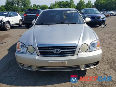 Piąte zdjęcie samochodu w środku: 2004 KIA OPTIMA LX V6 VIN:KNAGD128145320414 - miniatura