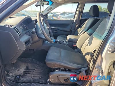 Zdjęcie 7 z 13 samochodu: 2010 JEEP GRAND CHEROKEE LAREDO VIN:1J4PR4GK8AC127558 - miniatura