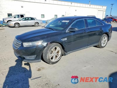 2015 FORD TAURUS SEL 1FAHP2E91FG154756 - główne zdjęcie licytacji z USA - miniatura