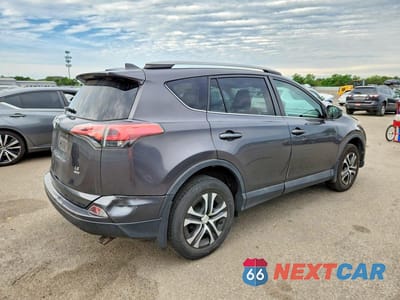 Trzecie zdjęcie samochodu z tyłu: 2016 TOYOTA RAV4 VIN:2T3BFREV0GW537084 - miniatura