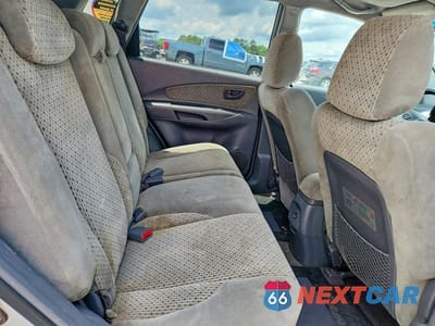 Zdjęcie 11 z 13 samochodu: 2005 HYUNDAI TUCSON GLS VIN:KM8JN12D05U131307 - miniatura