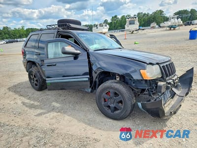 Czwarte zdjęcie samochodu z boku: 2009 JEEP GRAND CHEROKEE LAREDO VIN:1J8GR48K09C542253 - miniatura
