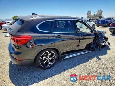 Trzecie zdjęcie samochodu z tyłu: 2019 BMW X1 SDRIVE28I VIN:WBXHU7C53K5L11227 - miniatura