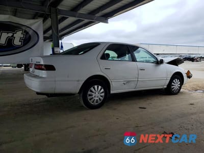 Trzecie zdjęcie samochodu z tyłu: 1999 TOYOTA CAMRY LE VIN:JT2BG22K7X0289606 - miniatura