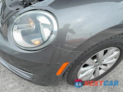 Zdjęcie 11 z 14 samochodu: 2014 VOLKSWAGEN BEETLE VIN:3VWFP7AT7EM621339 - miniatura