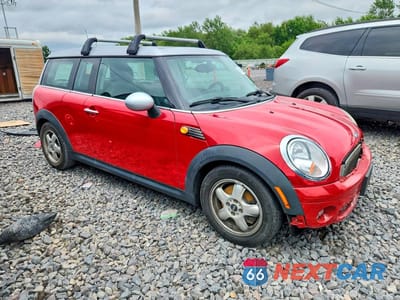 Czwarte zdjęcie samochodu z boku: 2010 MINI COOPER CLUBMAN VIN:WMWML3C51ATX37058 - miniatura