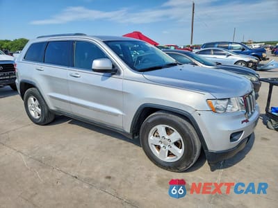 Czwarte zdjęcie samochodu z boku: 2011 JEEP GRAND CHEROKEE LAREDO VIN:1J4RS4GG6BC573573 - miniatura