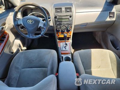 Zdjęcie 8 z 12 samochodu: 2009 TOYOTA COROLLA XLE VIN:1NXBU40E19Z074559 - miniatura