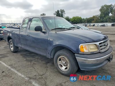 Czwarte zdjęcie samochodu z boku: 2000 FORD F150 VIN:1FTZX1721YKB23838 - miniatura
