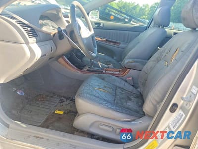 Zdjęcie 7 z 12 samochodu: 2002 TOYOTA CAMRY XLE V6 VIN:4T1BF30K22U513896 - miniatura